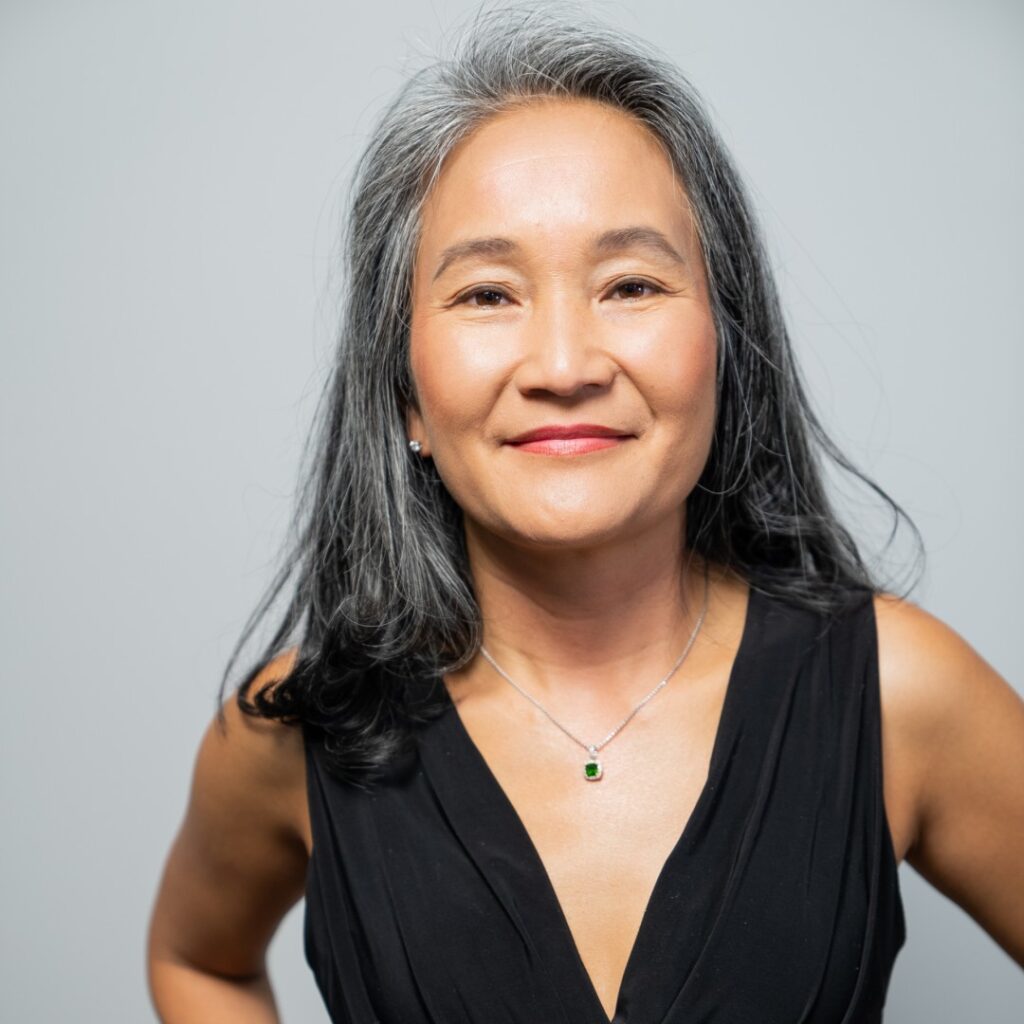 Nhi Aronhein the Might Mediator in black dress